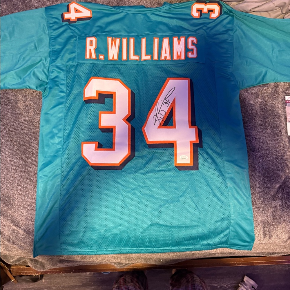 Teal Football Jersey with Number 34